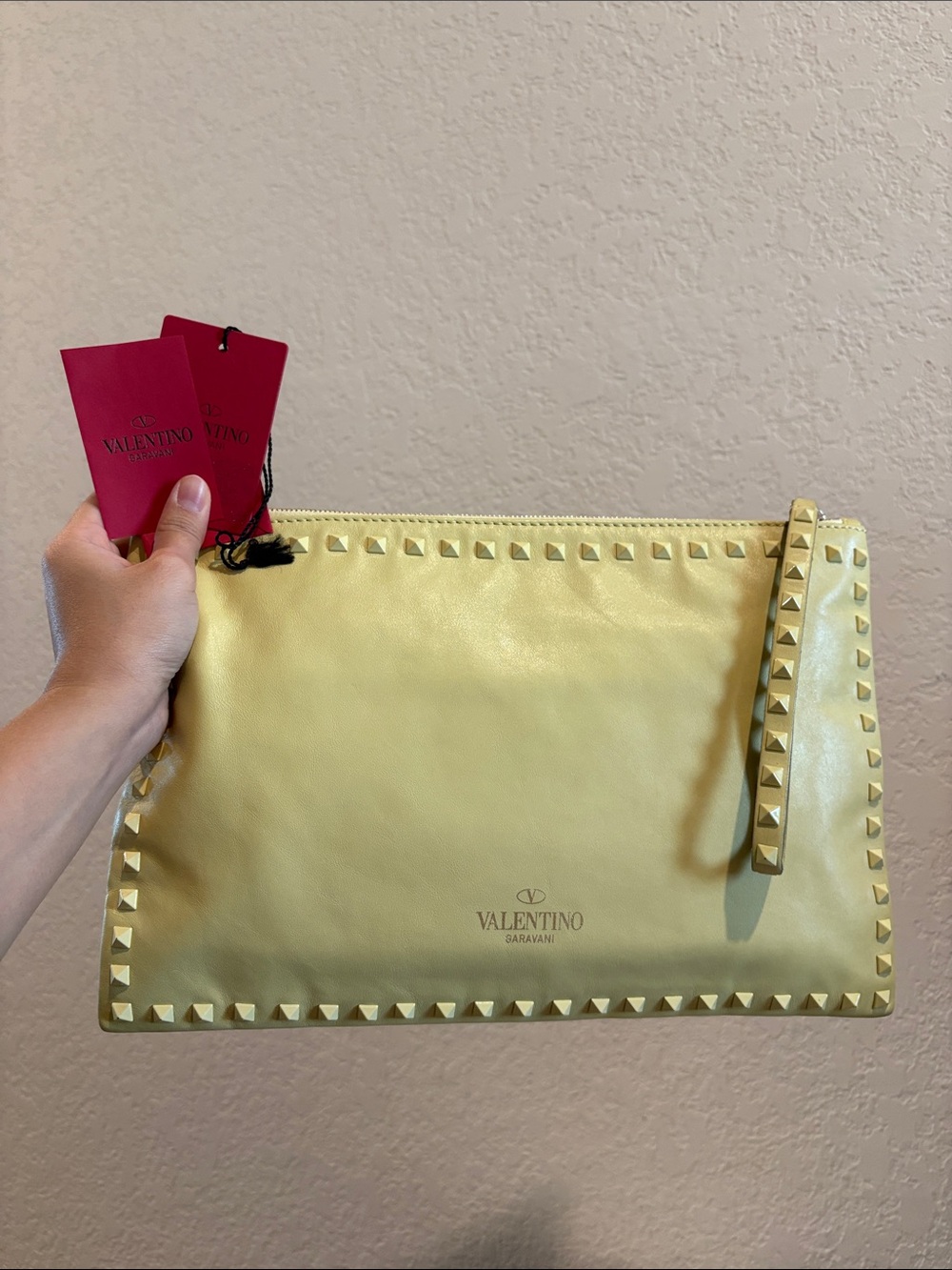 Valentino Garavani Yellow Rockstud Leather Wristlet Clutch